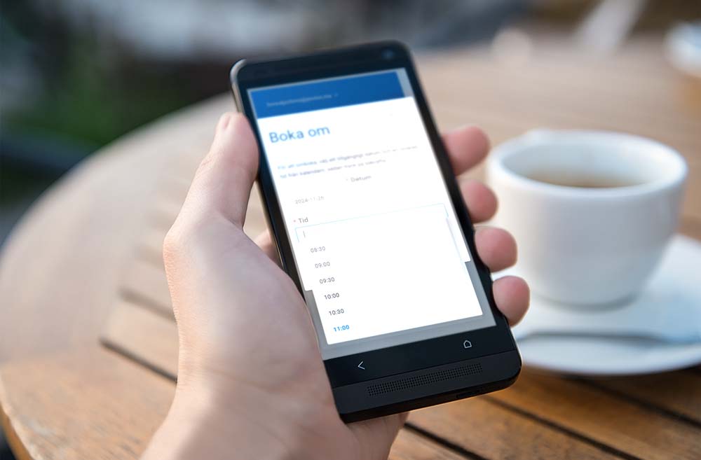 en telefon som demonstrerar ombokning av städning i Avesta
